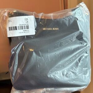 Michael Kors Men’s Jet Set Travel Messenger Bag in Black Saffiano Leather